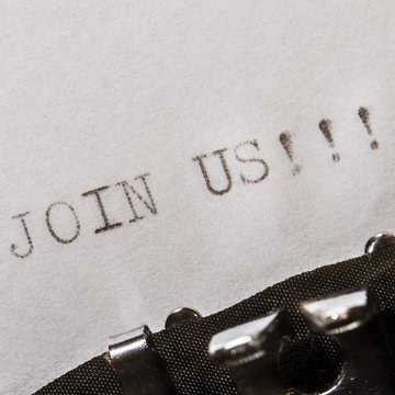 old typewriter with text join us