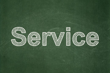 Finance concept: Service on chalkboard background