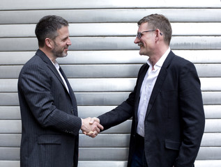 two men shaking hands