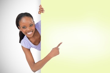 Poster - Composite image of smiling young girl showing card