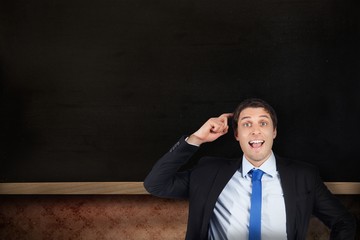Poster - Composite image of thinking businessman scratching head