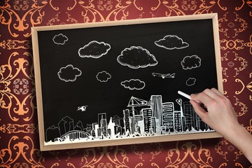 Poster - Composite image of hand drawing cityscape with chalk