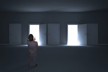 Poster - Composite image of thinking businessman holding pen