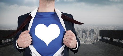 Poster - Composite image of businessman opening his shirt superhero style