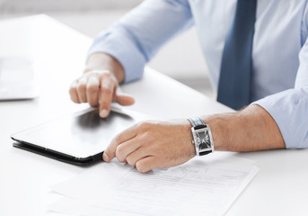 Wall Mural - businessman with tablet pc in office