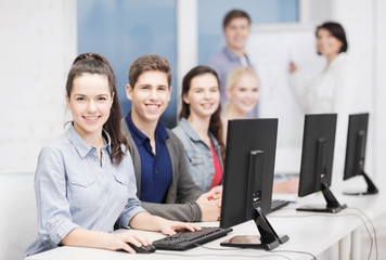 Wall Mural - students with computer monitor at school