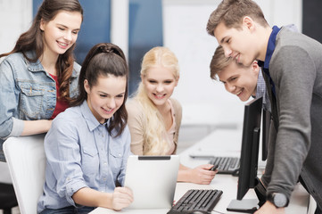 Wall Mural - students with computer monitor and tablet pc