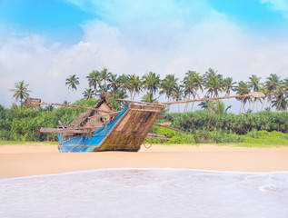 Wall Mural - Fishing boat at beautiful ocean palm beach