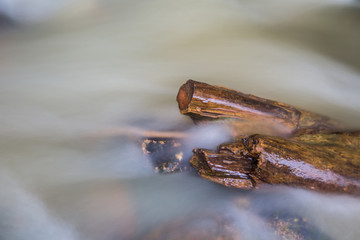 Water and rock  in the river natural motion blur abstract