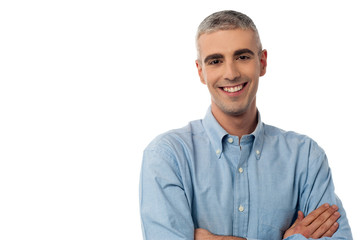 Wall Mural - Smiling handsome man isolated on white