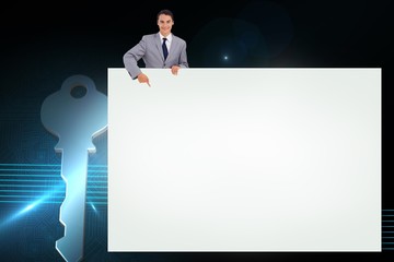 Fototapete - Composite image of businessman showing card