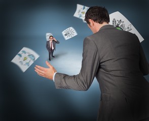 Poster - Composite image of businessman posing with hands out with tiny b