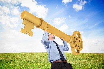 Poster - Composite image of businessman carrying large key