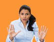 © pathdoc - stop! Offended woman asking to stay away, orange background