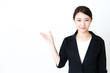 © taka - asian businesswoman showing on white background