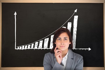 Poster - Composite image of smiling thoughtful businesswoman