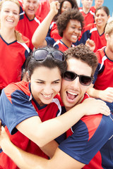 Canvas Print - Sports Spectators In Team Colors Celebrating