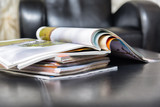 Fototapeta  - pile of magazines at home