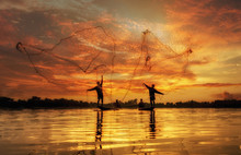 Fisherman Of Lake In Action When Fishing, Thailand