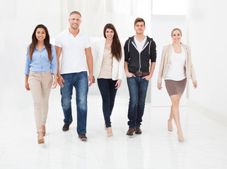 Confident Businesspeople Walking Together