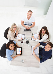 Wall Mural - Businesspeople Working At Desk