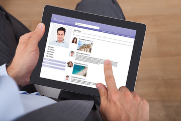 Poster - Businessman Surfing Social Networking Site On Digital Tablet
