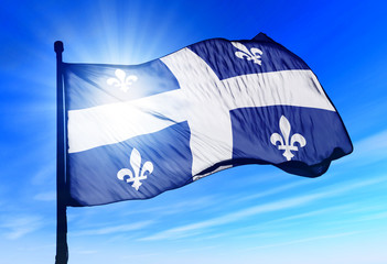Wall Mural - Quebec (Canada) flag waving on the wind