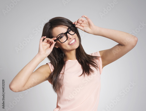 Fényképezés Beautiful woman wearing fashionable glasses