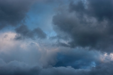 Wall Mural - Stormy clouds on spring evening.