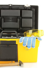 Wall Mural - Open yellow tool box with tools  on white background close-up