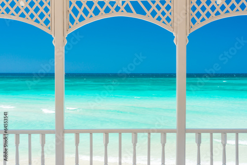 Fototapeta na wymiar Terrace with a view of a tropical beach in Cuba