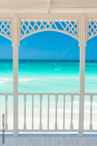 Obraz w ramie Wooden terrace with a view of a tropical beach in Cuba