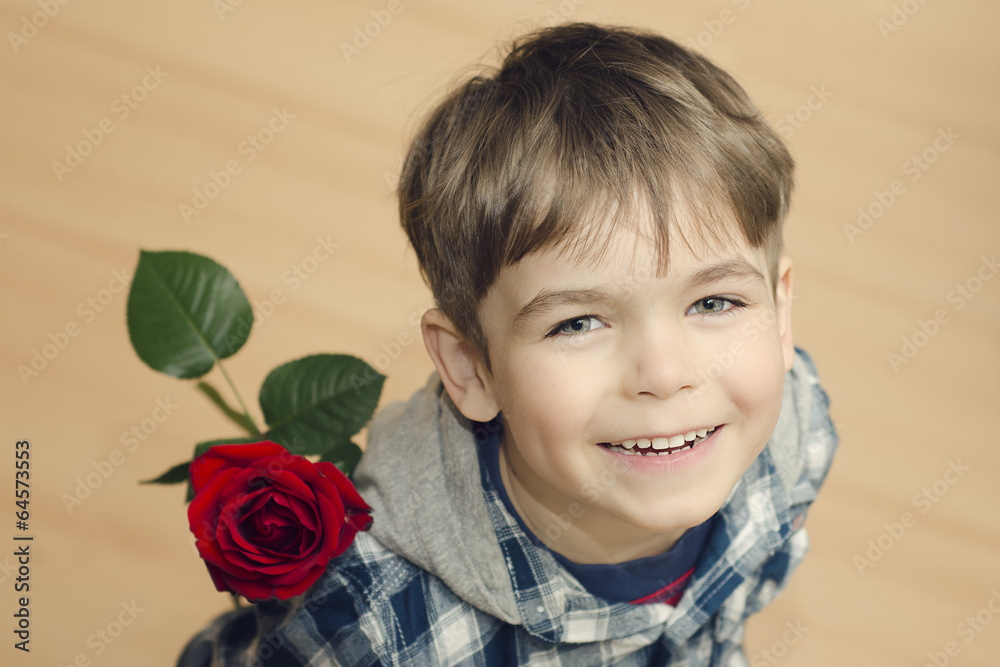 Chłopiec z różą - obrazy, fototapety, plakaty 
