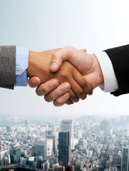 Poster - businessman and businesswoman shaking hands