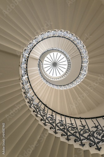 Fototapeta na wymiar Upside view of a spiral staircase