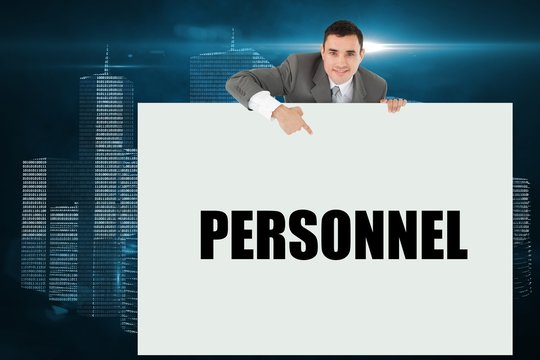 Businessman showing card saying personnel