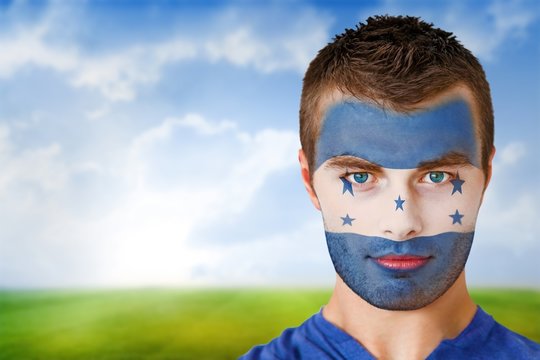 Honduras football fan in face paint