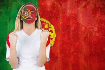 Wall Mural - Excited portugal fan in face paint cheering