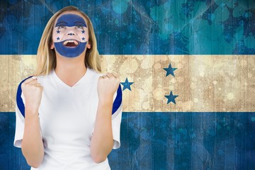 Wall Mural - Excited honduras fan in face paint cheering