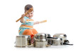 baby boy using wooden spoons to bang pans drumset