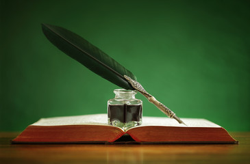 Wall Mural - Quill pen and inkwell on old book