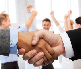 Poster - businessman and businesswoman shaking hands