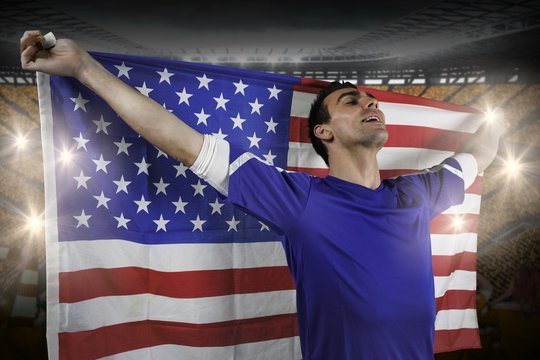 American soccer fan holding flag