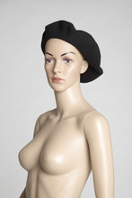 Female Manikin Model Used For Modelling Clothes In A Shop