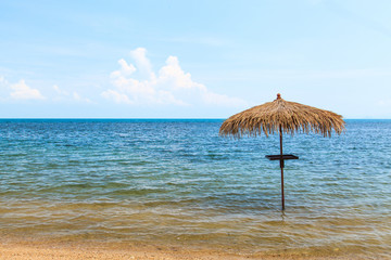 Wall Mural - Umbrella on tropical beach