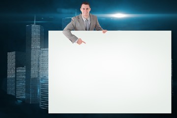 Wall Mural - Composite image of businessman showing card