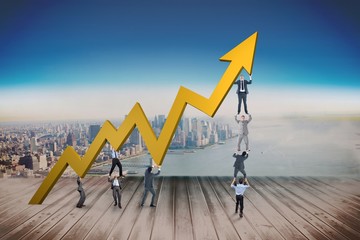 Poster - Composite image of business team holding up arrow