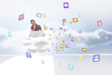 Poster - Composite image of thinking man sitting on floor using laptop an