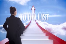 To Do List Against Red Steps Arrow Pointing Up Against Sky