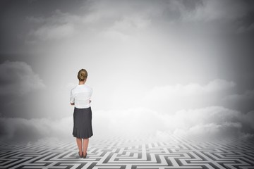 Poster - Composite image of thinking businesswoman